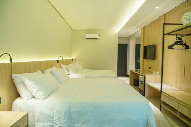 Quarto Triplo Premium