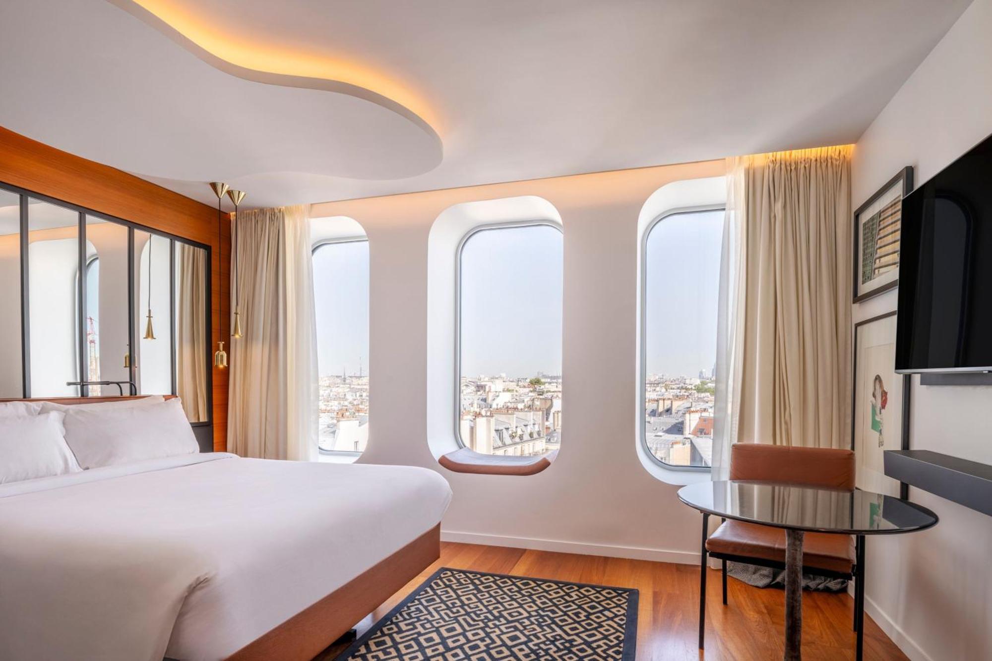 Quarto Vista Urbana e Vista da Cobertura de Paris
