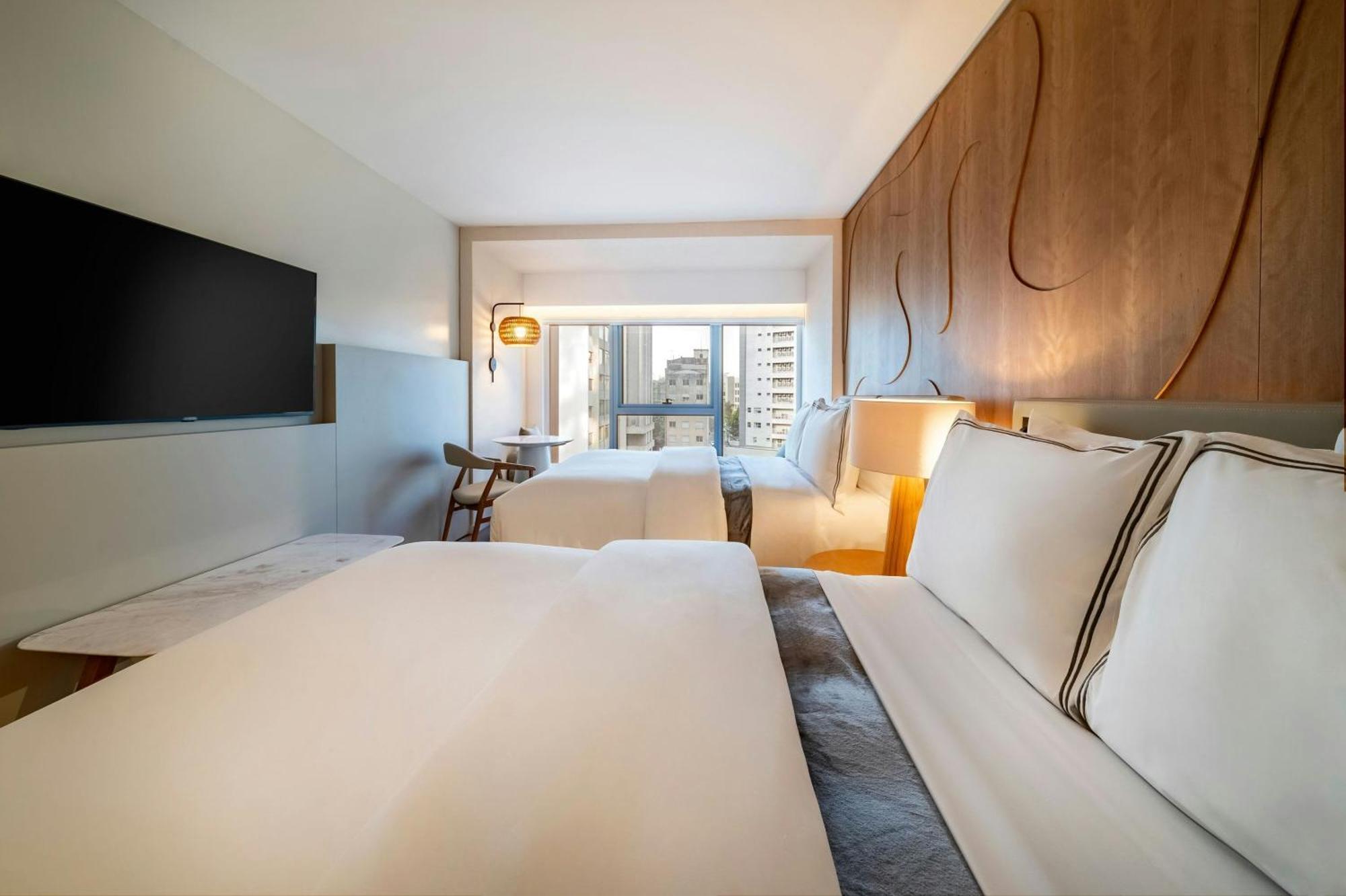 Quarto Premium com 2 Camas de Casal