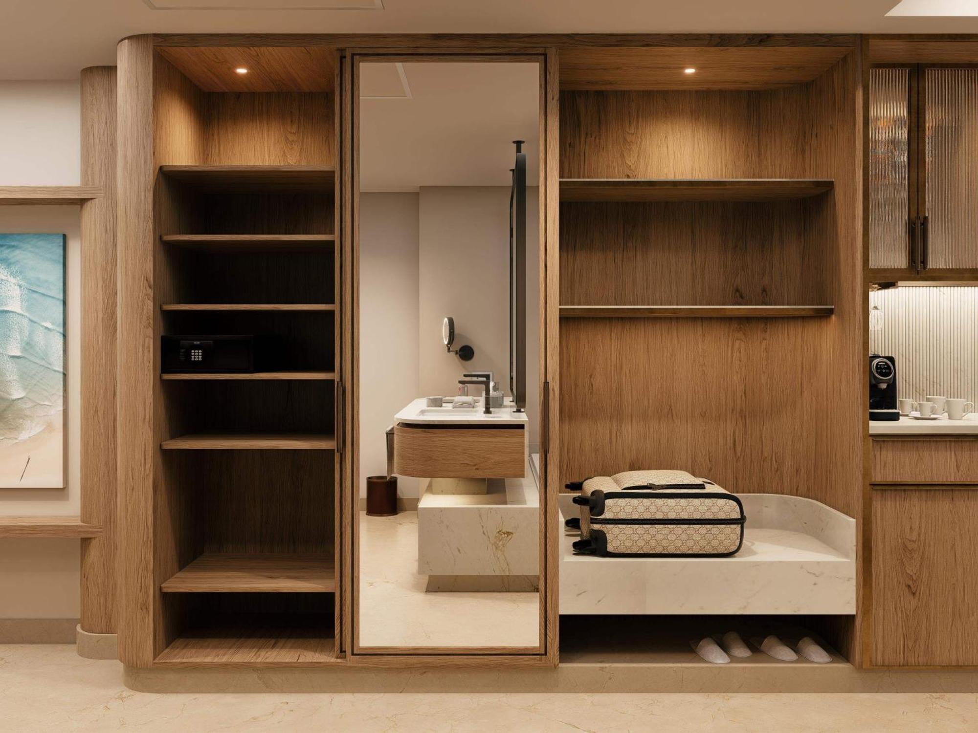 Suíte superior Governor com cama king-size e vista do mar