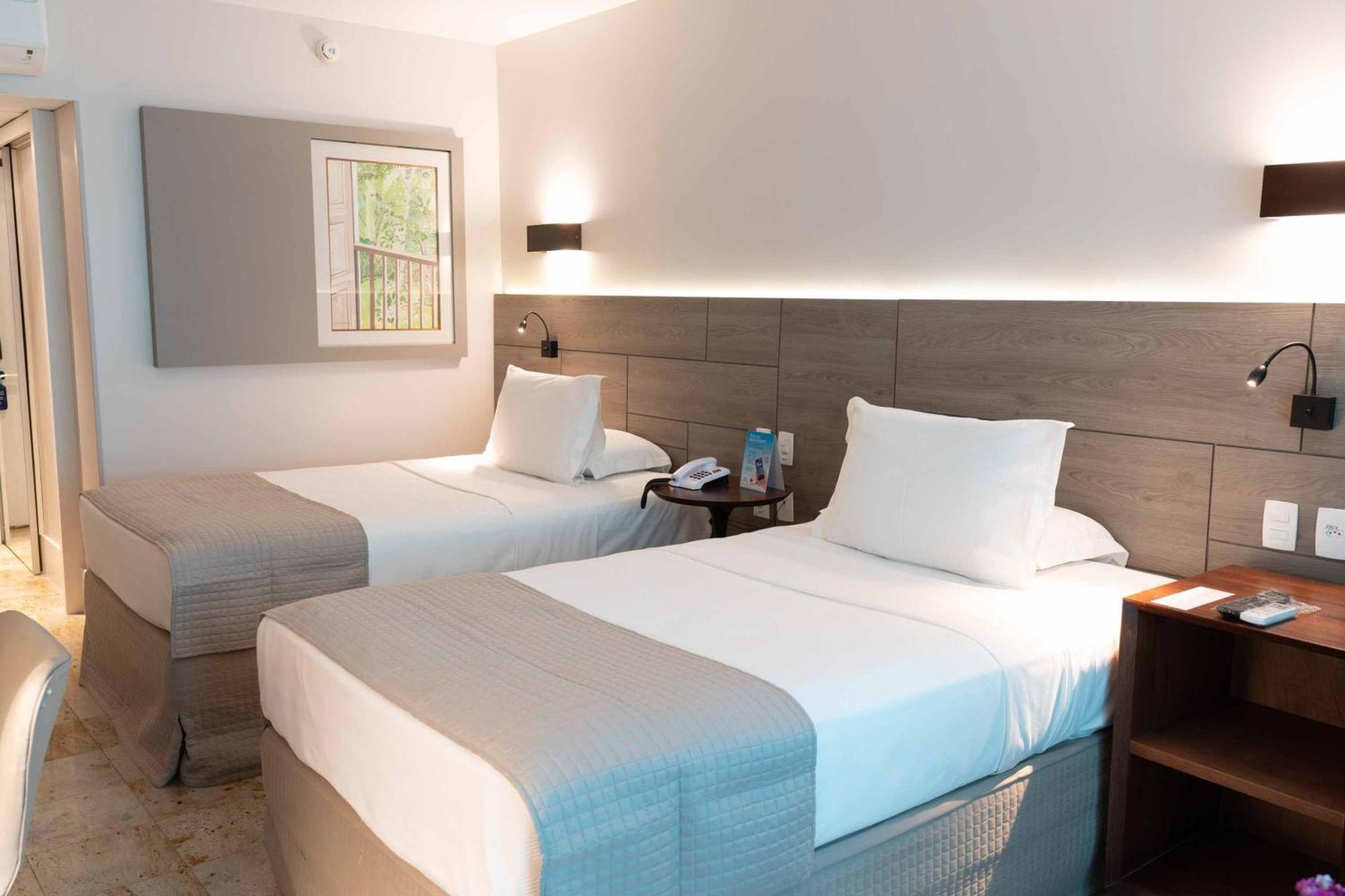 Quarto clássico com 2 camas de solteiro