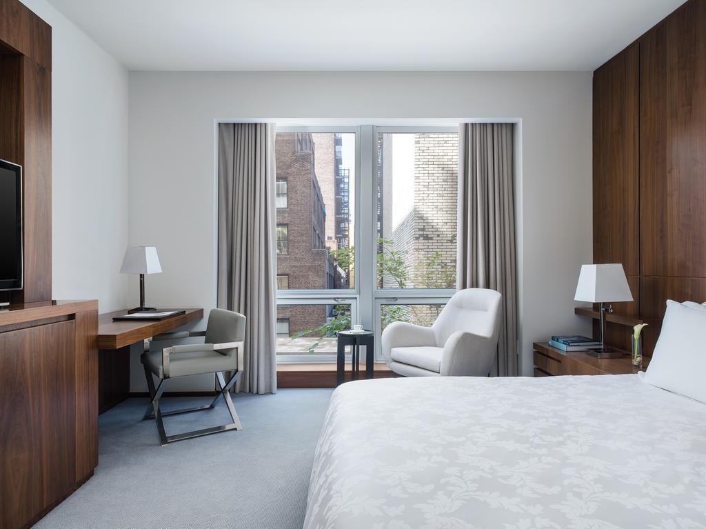 Quarto Superior com Cama King-size e Vista da Cidade