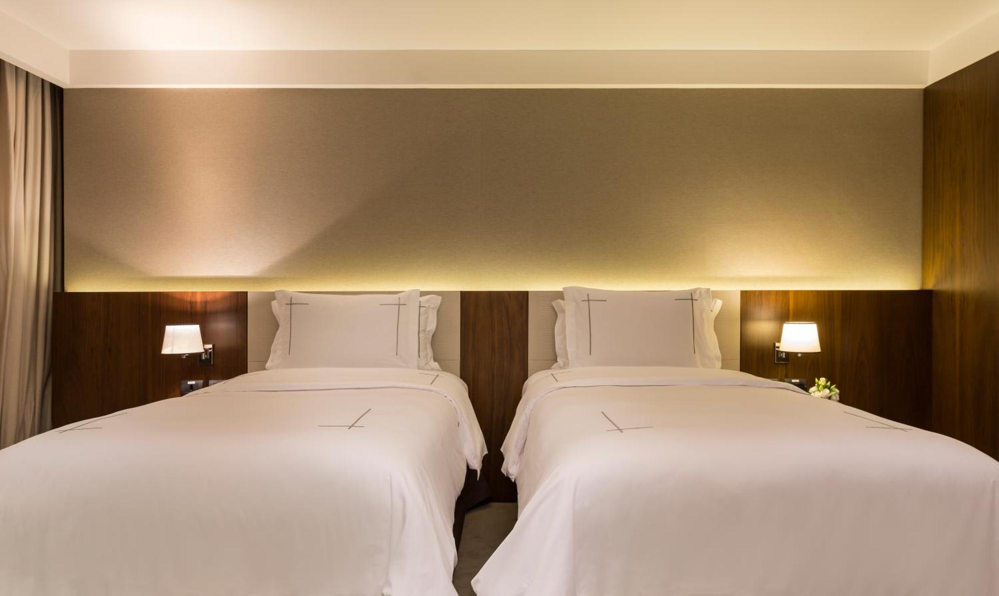 Quarto Deluxe Plus com 2 Camas de Solteiro e Vista da Cidade